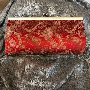 Small clutch. New. Red & gold.